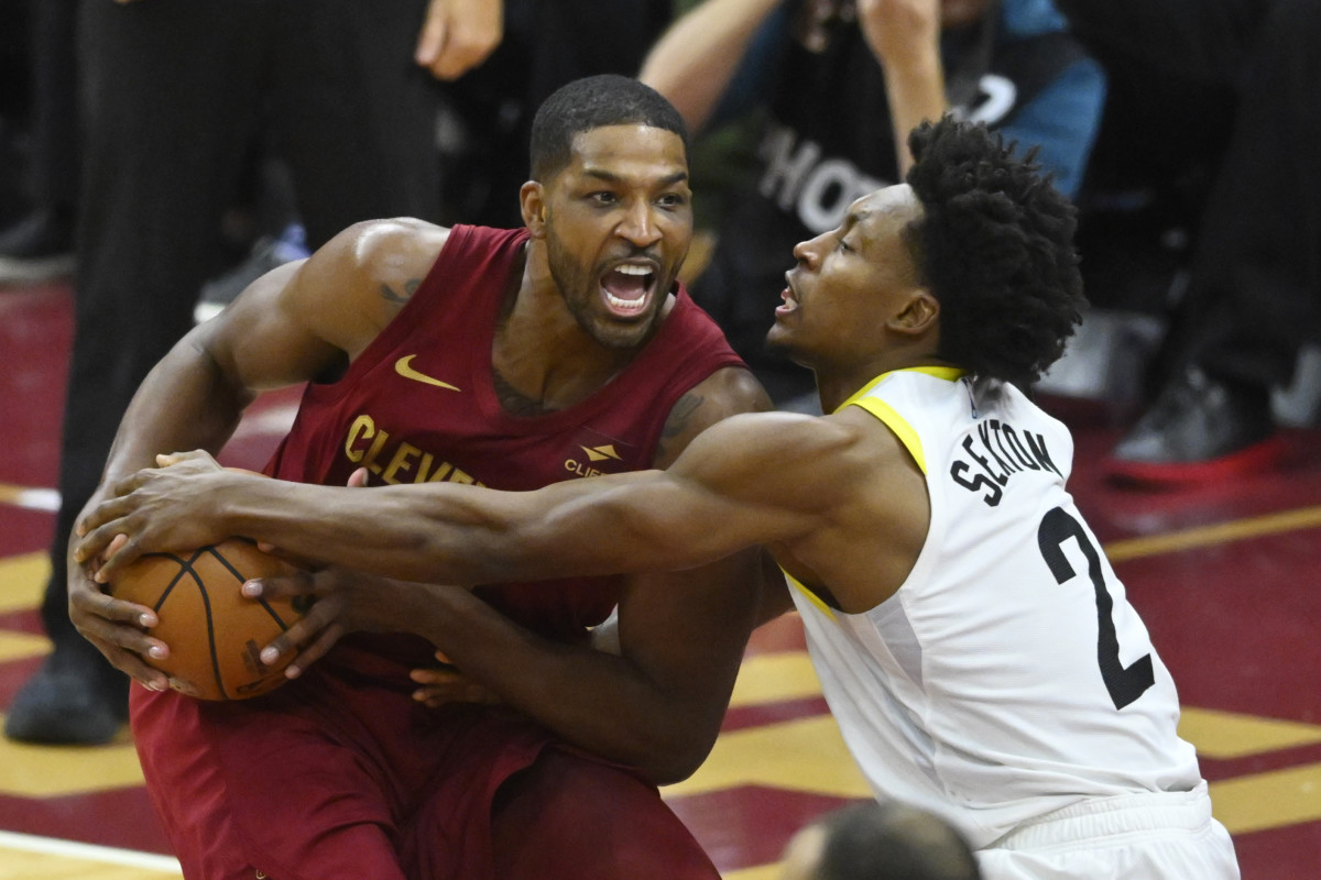 Dec 20, 2023; Cleveland, Ohio, USA; Utah Jazz guard Collin Sexton (2) defends Cleveland Cavaliers center Tristan Thompson (12) in the fourth quarter at Rocket Mortgage FieldHouse.